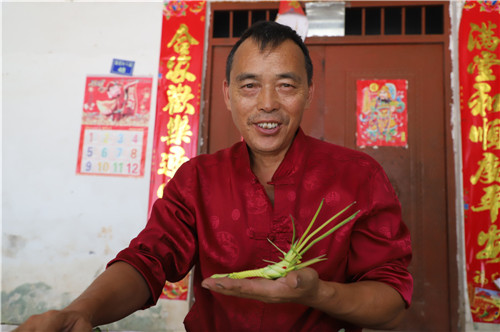 黎明贵：糖画+棕编 做传统手艺守护人