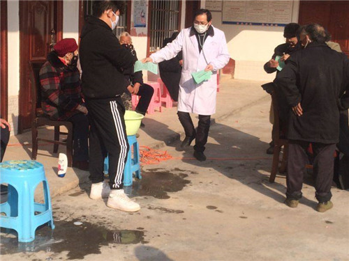 高塔镇：疫情无情人有情 志愿服务献爱心