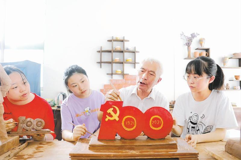 非遗泥塑雕刻“百年记忆”
