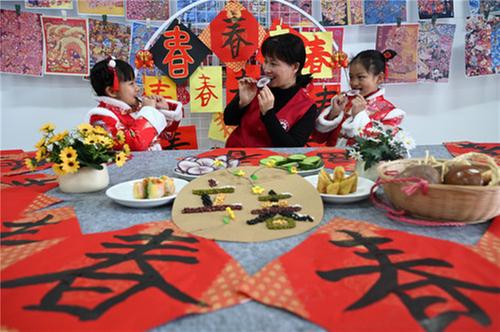 东兴区：多彩民俗迎立春